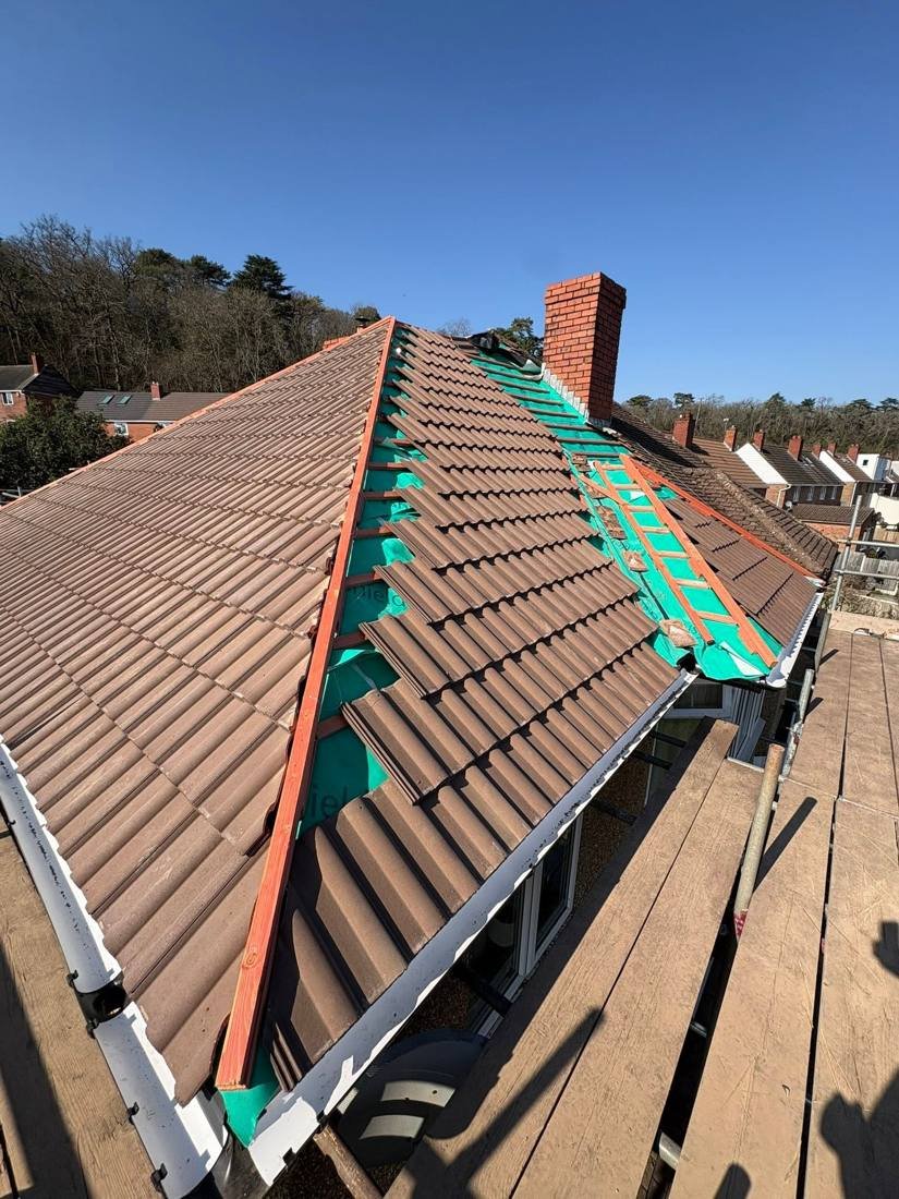 Roof tiles being laid