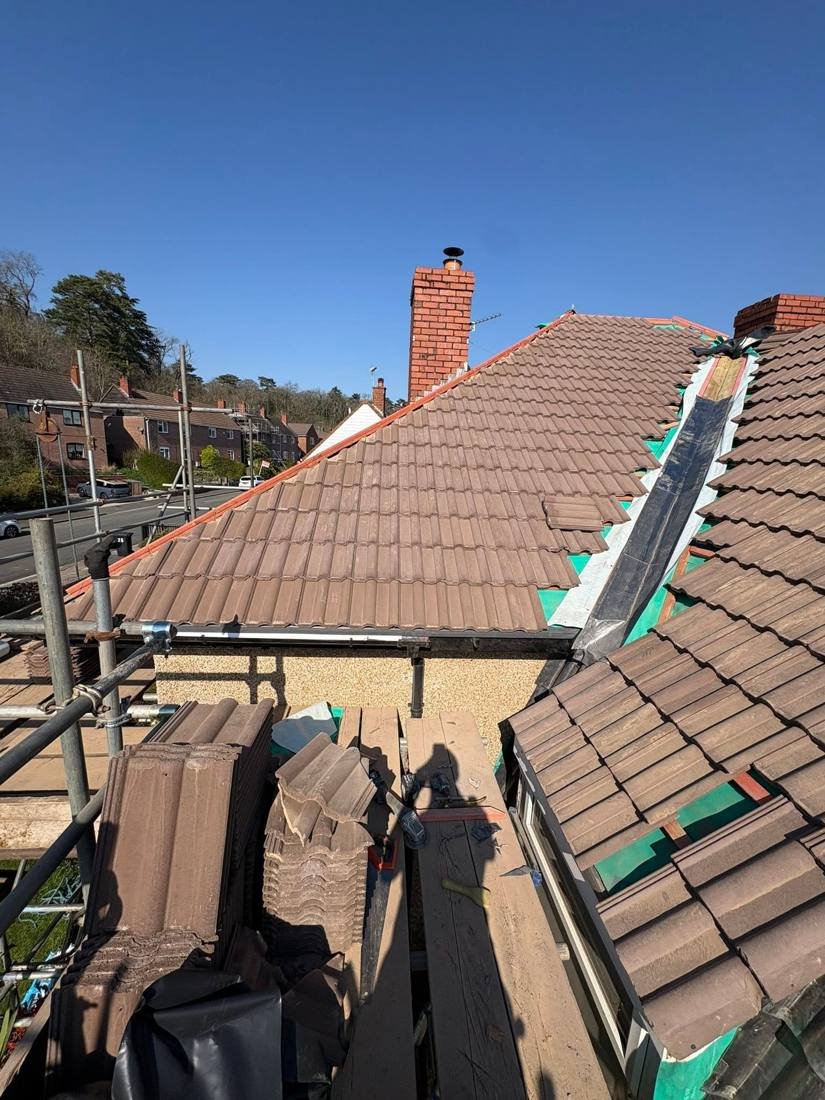 Roof tiles being laid